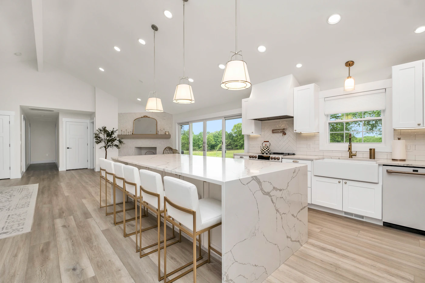 Large renovated kitchen with marble island